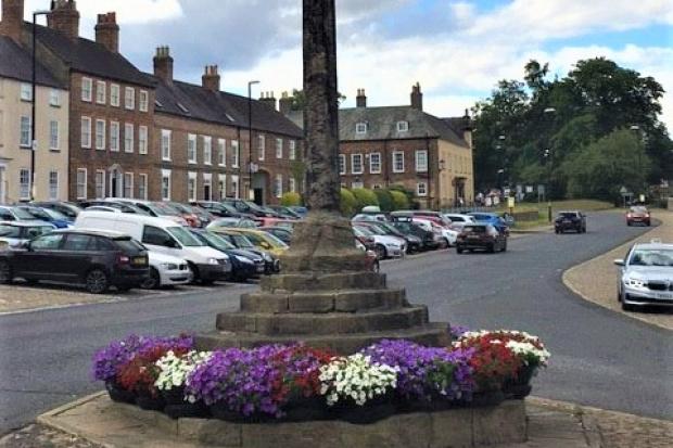 Town councillors are to explore whether a voluntary crier could help the town