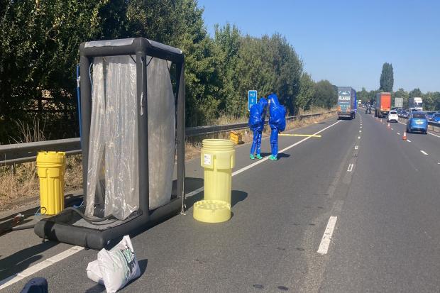 Emergency services dealing with corrosive liquid on M3 on Wednesday, August 11. Photo: Hampshire Roads Policing Unit