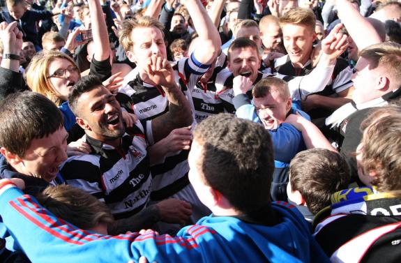 The Northern Echo: Darlington players celebrate with fans at becoming champions of the Northern League after their 3-1 victory over Team Northumbria. The Northern Echo: Darlington players celebrate with fans at becoming champions of the Northern League after their 3-1 victory over Team Northumbria.