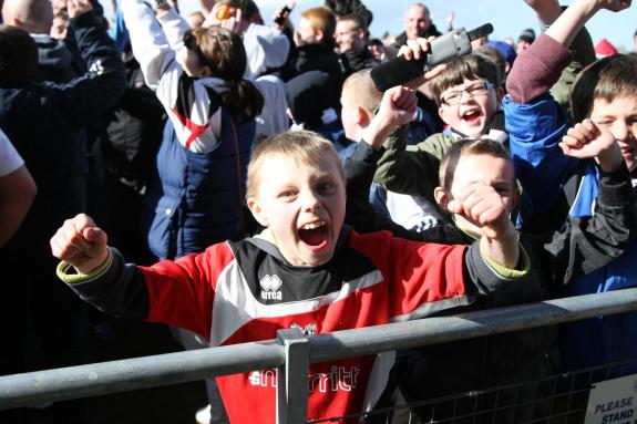 The Northern Echo: A young Darlington fan celebrates his team becoming champions of the Northern League after their 3-1 victory over Team Northumbria. The Northern Echo: A young Darlington fan celebrates his team becoming champions of the Northern League after their 3-1 victory over Team Northumbria.