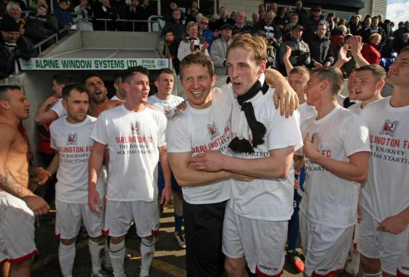The Northern Echo: Darlington players celebrate with fans at becoming champions of the Northern League after their 3-1 victory over Team Northumbria.
Picture by Tom Banks 27-04-13 The Northern Echo: Darlington players celebrate with fans at becoming champions of the Northern League after their 3-1 victory over Team Northumbria.
Picture by Tom Banks 27-04-13