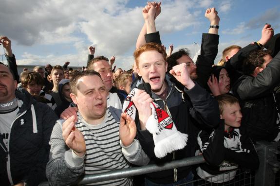 The Northern Echo: Darlington fans celebrate at becoming champions of the Northern League after their 3-1 victory over Team Northumbria. The Northern Echo: Darlington fans celebrate at becoming champions of the Northern League after their 3-1 victory over Team Northumbria.