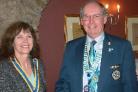 HANDING OVER: President Lesley Beddie with district governor George Craig