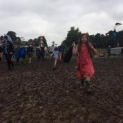 A young festival-goer walks near the main stage at the Deer Shed Festival 2019