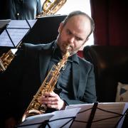 Festival Director Paul Edis gets the event underway with the Early Bird Big Band. Pictures: Chris Barron
