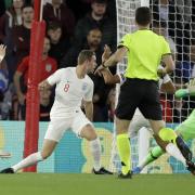 Valon Berisha curls home Kosovo's second goal in their 5-3 defeat to England at Southampton's St Mary's Stadium