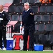 Steve Bruce delivers some instructions to his players during Newcastle's 4-1 win at Bournemouth on Wednesday night