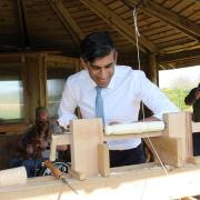 Rishi Sunak tries his hand on the pole lathe in The Fold’s Veteran’s woodcraft shelter