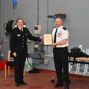 Assistant Chief Fire Officer Sarah Nattrass with Frank Stephenson