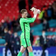 Jordan Pickford applauds the England fans at Wembley