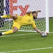 Gianluigi Donnarumma saves Alvaro Morata's penalty as Italy beat Spain on penalties