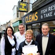 Jane and Clem Oxenham celebrate the 60th anniversary of the business, with son Peter and his daughter Nicola