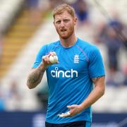 Ben Stokes warms up for England.