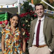 Joséphine Jobert (left) and Ralph Little on set for the Death in Paradise 2021 Christmas special (Denis Guyenon/Red Planet Pictures/BBC)