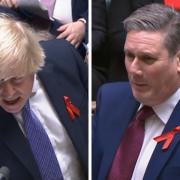 Boris Johnson and Keir Starmer were both seen wearing the red ribbons at PMQs