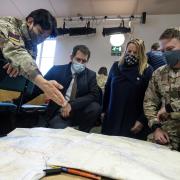 Durham County Council chief executive John Hewitt, centre left, and leader, Amanda Habgood, centre right, discuss the aid delivery effort with military personnel