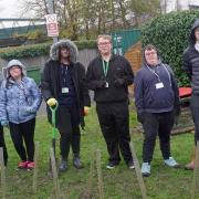 Next Steps students at Darlington College plant trees to improve the environment