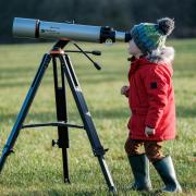 Samuel Startup, aged four,  looks to the skies at Adderstone Field in Dalby Forest as Forestry England launch a schools competition to design an observatory Picture: Tony Bartholomew