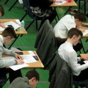 GCSE exams at 16 should be scrapped with pupils testing until 19, report argues. (PA)