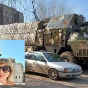 Karl Alexander, pictured with his partner Eelena Dudchenko, took this photo today of military presence in Ukraine