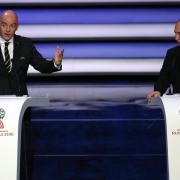 Russian president Vladimir Putin (right) and FIFA President Gianni Infantino (PA)