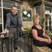 Alpine Guest House owner Jacqueline Dunn with Business Link's Stephen Gibson
