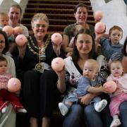 National Breast Feeding week in 2007 and Darlington Mayor Marian Swift is pictured on the town hall steps with the Darlington breast feeding awareness group and their knitted boobs