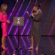 Amadna Holden on stage with Andrew Basso in Britain's Got Talent episode (ITV)
