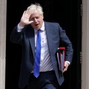 Boris Johnson waved for the cameras as he left Number 10 for Prime Ministers Questions on Wednesday (July 6). Picture: PA