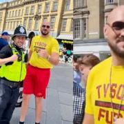 The boxer, nicknamed ‘The Gypsy King’, was seen greeting fans and cutting a cool figure in a yellow ‘Tyson Fury’ t-shirt and a pair of red shorts. Picture: NORTHUMBRIA POLICE