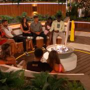 Islanders around the firepit. Love Island continues tomorrow at 9pm on ITV2 and ITV Hub. Episodes are available the following morning on BritBox. Credit: ITV