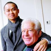 ETERNALLY GRATEFUL: Councillor Peter Freitag with Huy Tran’s son, Lee