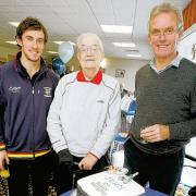 STICKY WICKET: The celebration cake at John Toft’s 90th. With him are Durham cricketer Will Smith, left, and head coach Geoff Cook