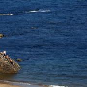 People enjoying the nice sunny weather at the coast, Cullercoats beach. Picture: LDRS