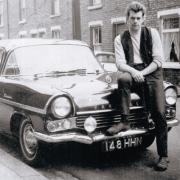 Clive Travis sitting proudly on his Vauxhall Cresta in the early 1960s in Chilton.