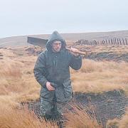 HIGH AND DRY: Mark Keefe on the top of Stainmore