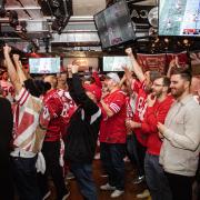 San Francisco 49ers fans watch the team's game against Atlanta Falcons in Leeds