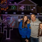 Incredible light show at The Stonebanks house in Hunwick pictured Megan 14 dad Brad and Molly 10 Picture: SARAH CALDECOTT