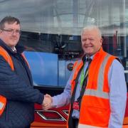 Paul, left, with Sunderland and Washington Area General Manager Malcolm