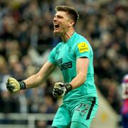 Nick Pope celebrates after his penalty-saving heroics helped Newcastle United knock Crystal Palace out of the Carabao Cup