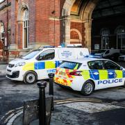 A man has been arrested after Darlington Station was evacuated this afternoon following reports of a suspected suspicious package on a train.