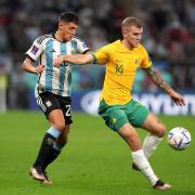 Middlesbrough midfielder Riley McGree shields the ball during Australia's defeat to Argentina in the last 16 of the World Cup