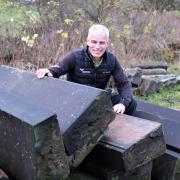 Area Manager Matt Neale, from the Yorkshire Dales National Park Authority’s Ranger Service, with some of the salvaged stone.