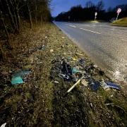 Pictures show debris strewn across roadside after crash the hospitalised seven
