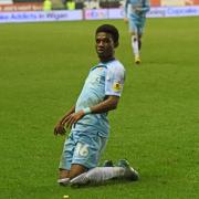 Amad Diallo celebrates after scoring Sunderland's final goal at Wigan