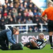 Bruno Guimaraes receives treatment for an ankle injury during the first half of Newcastle United's 1-0 win over Fulham. Picture: OWEN HUMPHREYS/PA WIRE