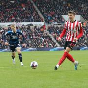 Dan Neil plays the ball forward during Sunderland's Wear-Tees derby win over Middlesbrough at the weekend