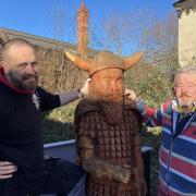 Bob Marshall, right, with Taff Watkins and the Viking statue