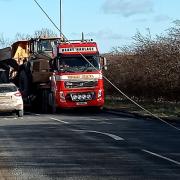 A hundred homes have been left without power and a road closed after an electric cable fell into the carriageway. |Picture: Geoff Gregg