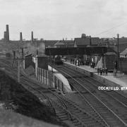 Cockfield station, looking towards Barnard Castle. On the left, the tracks lead into the yard of New Copley Colliery which was sunk in 1867 and employed about 250 men at the start of the 20th Century. The chimneys in the background are all connected to